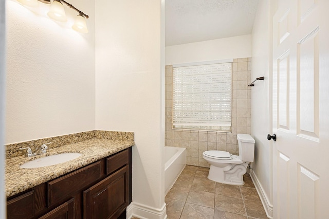 full bath with vanity, baseboards, a bathing tub, and toilet
