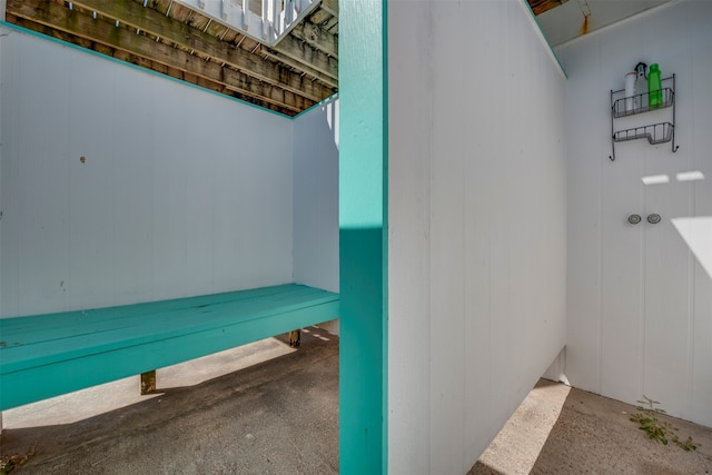 bathroom featuring concrete flooring