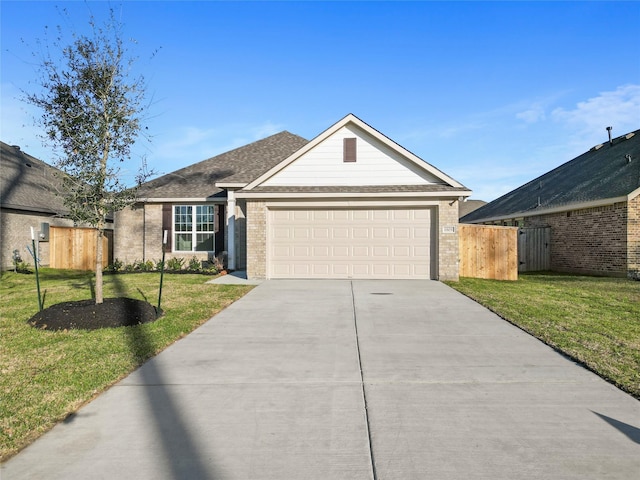 ranch-style home with an attached garage, brick siding, fence, concrete driveway, and a front yard