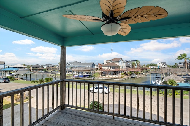 wooden deck with a water view