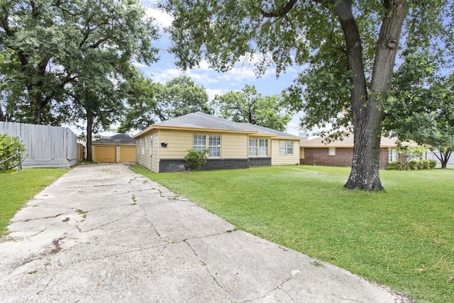 13210 Rockglen St, Houston, TX 77015 - view of front of house with a detached garage