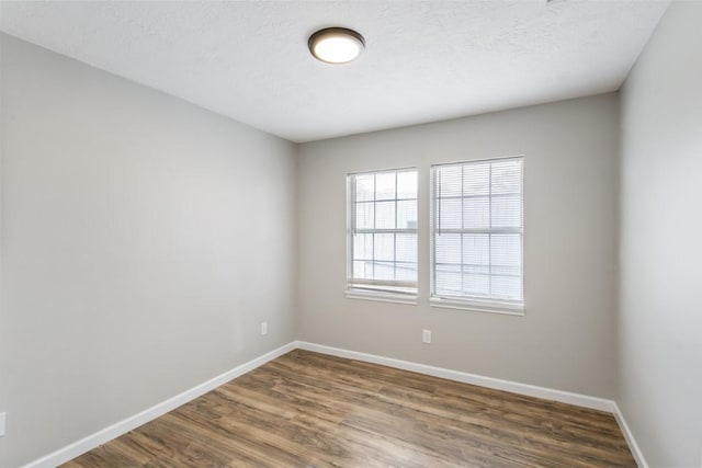13210 Rockglen St, Houston, TX 77015 - empty room featuring wood finished floors
