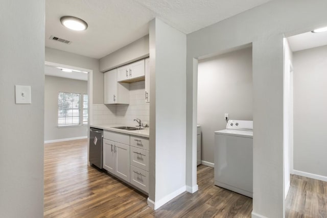 13210 Rockglen St, Houston, TX 77015 - washroom featuring washer / clothes dryer and wood finished floors