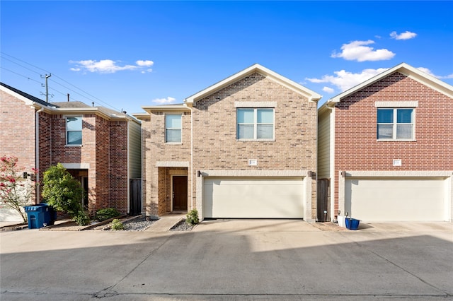 multi unit property featuring a garage