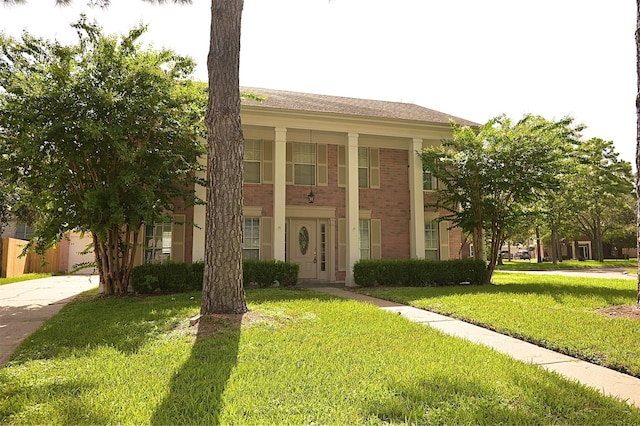 view of front of house with a front lawn