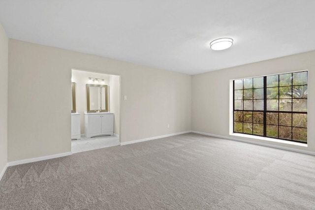 1504 Maiden Ln, Richmond, TX 77469 - spare room featuring carpet and baseboards