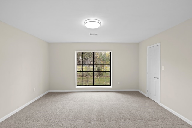 view of carpeted spare room