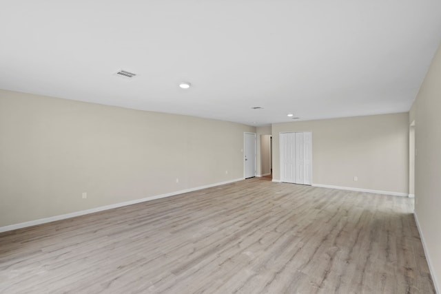 empty room featuring light hardwood / wood-style floors