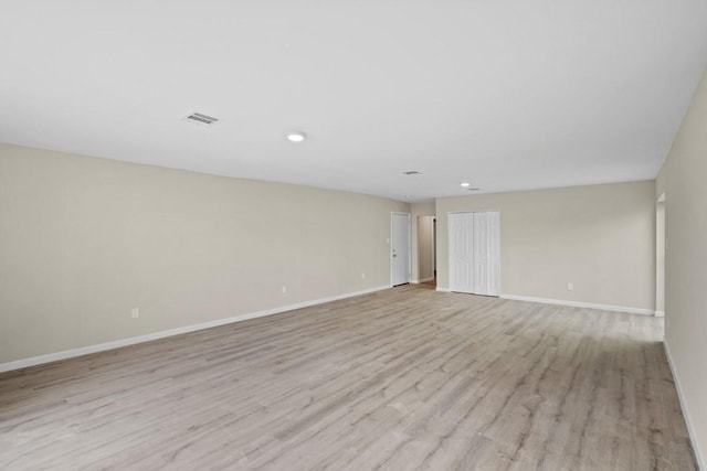 1504 Maiden Ln, Richmond, TX 77469 - spare room with light wood finished floors, baseboards, and recessed lighting