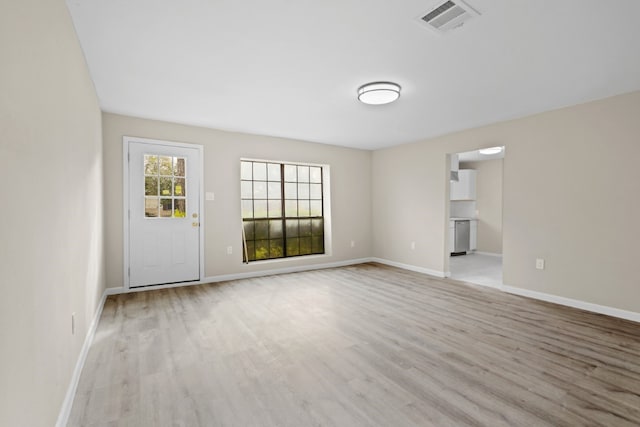 interior space with light hardwood / wood-style floors