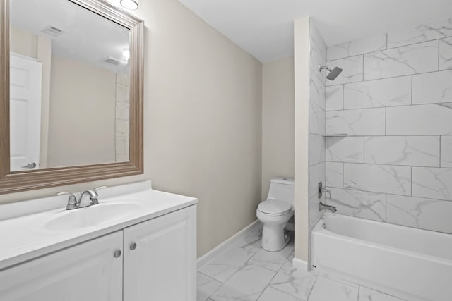 full bathroom featuring vanity, toilet, and tiled shower / bath combo