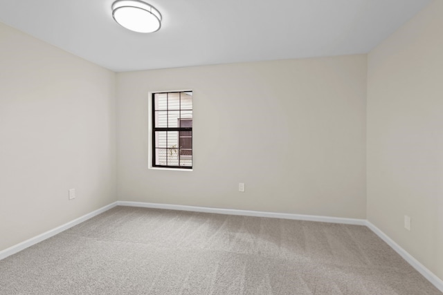 empty room featuring carpet flooring