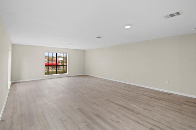 1504 Maiden Ln, Richmond, TX 77469 - unfurnished room featuring light wood-type flooring, baseboards, and recessed lighting