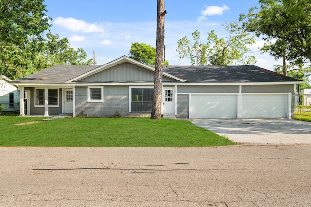 single story home featuring a front yard and a garage