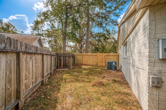 view of yard with central AC