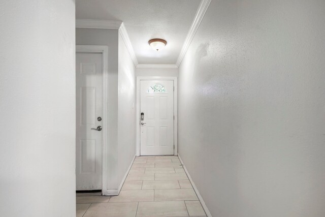 doorway featuring light tile patterned floors and crown molding