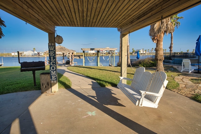 view of patio / terrace featuring a water view