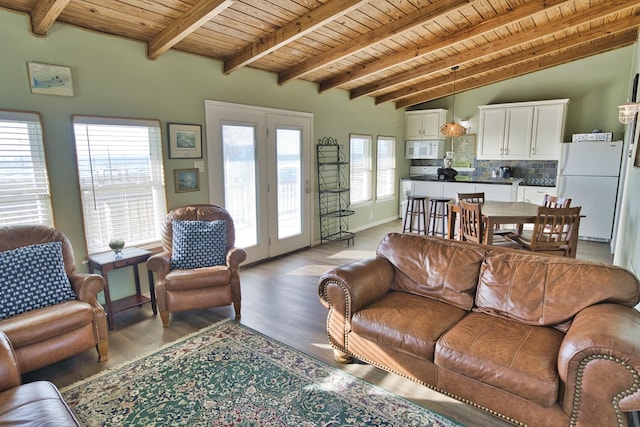 living room with beamed ceiling, light wood-style flooring, and wood ceiling