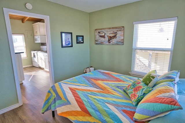 bedroom featuring hardwood / wood-style floors