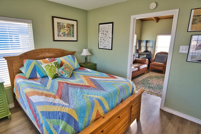 bedroom featuring hardwood / wood-style floors