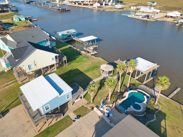 aerial view featuring a residential view and a water view