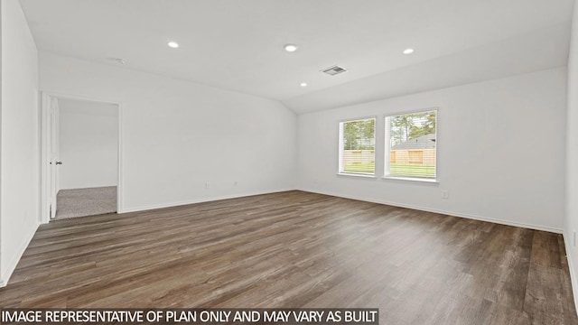 unfurnished room featuring dark wood-type flooring and lofted ceiling