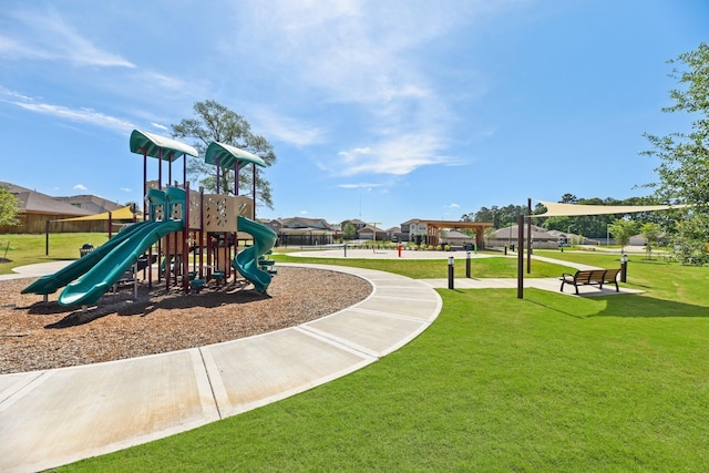 view of play area featuring a lawn