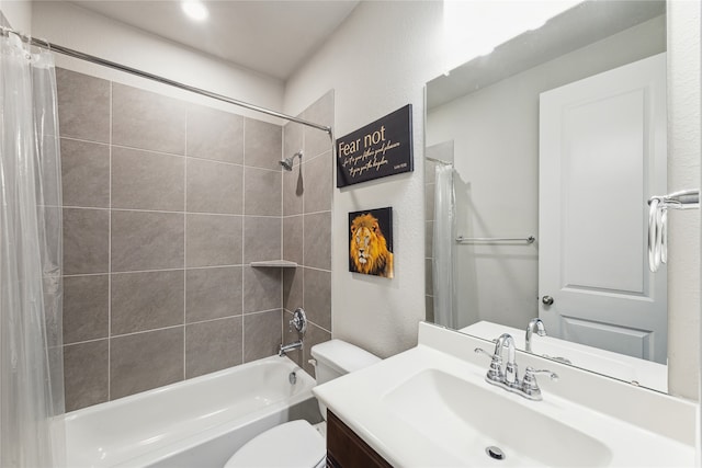 full bathroom featuring vanity, toilet, and shower / tub combo