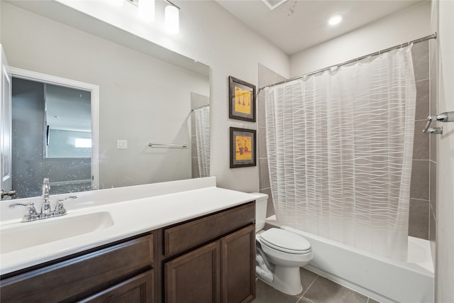 full bathroom featuring vanity, shower / tub combo with curtain, toilet, and tile patterned flooring