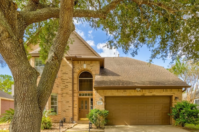 view of front of property featuring a garage