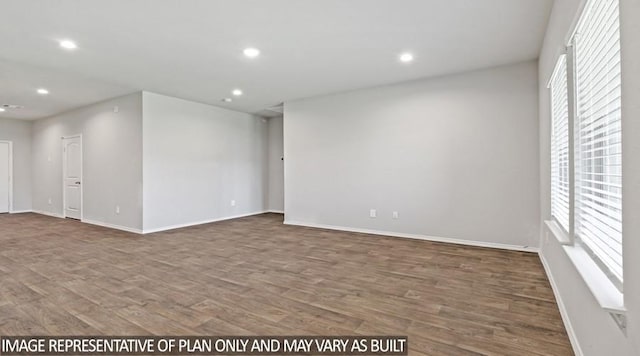 40746 Rosemary Rain, Magnolia, TX 77354 - spare room with healthy amount of natural light, wood finished floors, baseboards, and recessed lighting