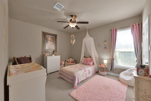 carpeted bedroom featuring ceiling fan