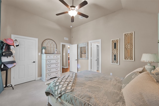 bedroom featuring light colored carpet, high vaulted ceiling, and ceiling fan