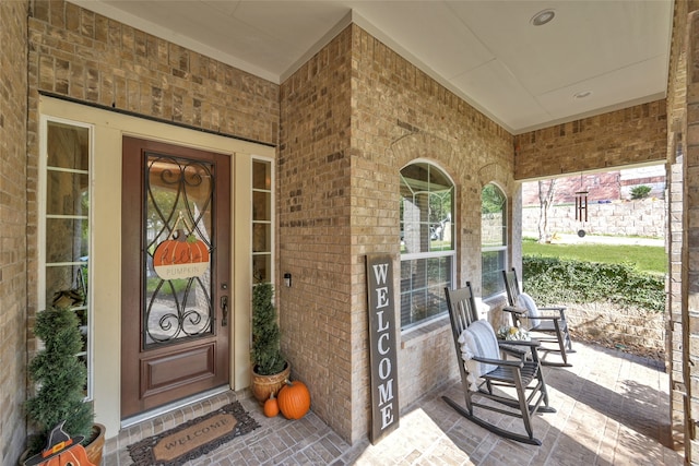 property entrance with a porch