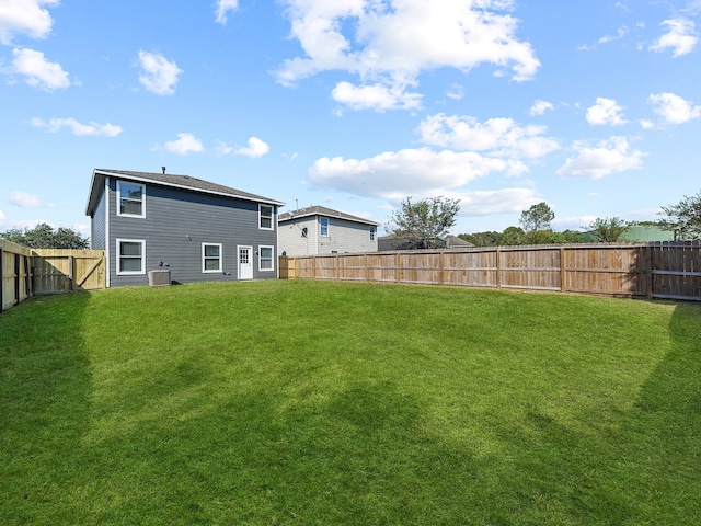 view of yard with central AC unit