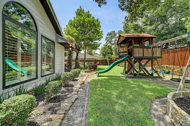 view of yard with a playground