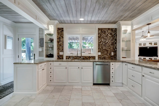 kitchen featuring stone counters, dishwasher, plenty of natural light, and white cabinets