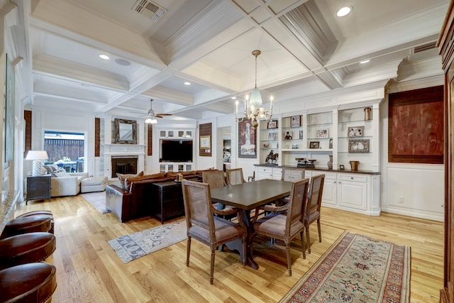 dining space with beamed ceiling, coffered ceiling, and light wood-type flooring