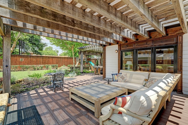 view of patio / terrace with a wooden deck, an outdoor living space, and a pergola