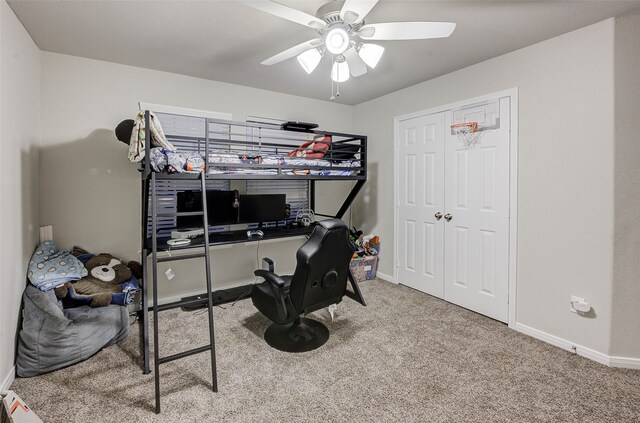 bedroom featuring ceiling fan and carpet floors