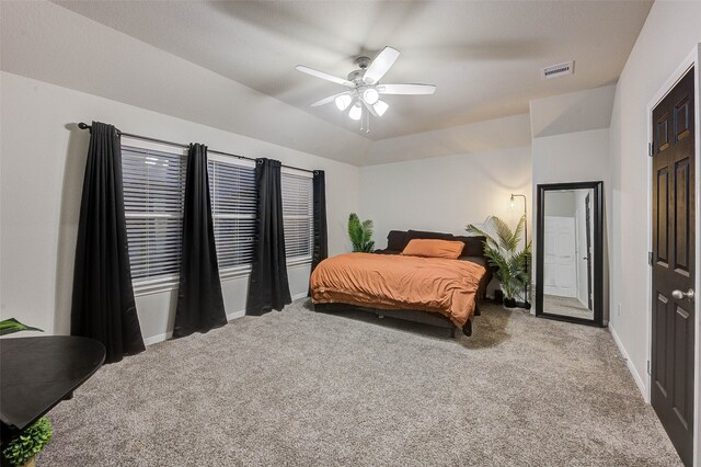 carpeted bedroom with ceiling fan