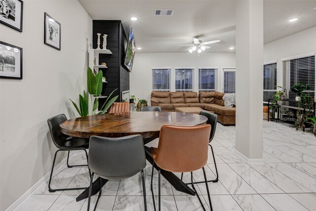 dining area featuring ceiling fan