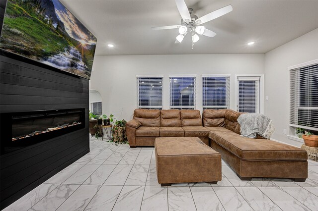 living room featuring ceiling fan