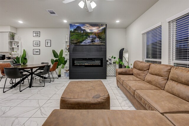 living room featuring ceiling fan