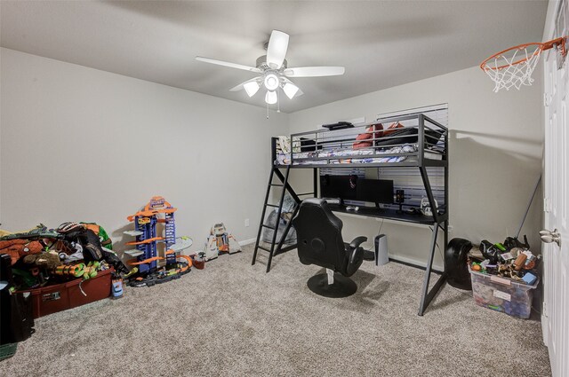 bedroom with ceiling fan and carpet floors