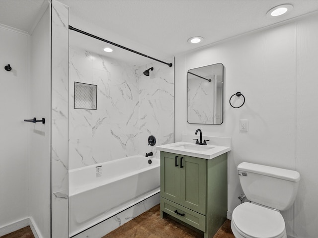 full bathroom with vanity, toilet, and tiled shower / bath