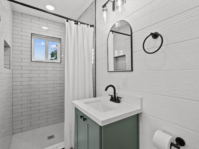 bathroom featuring vanity and a shower with curtain