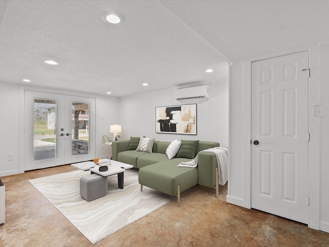 carpeted living room with a wall unit AC, french doors, and a textured ceiling