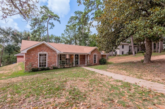 view of front of property with a front lawn