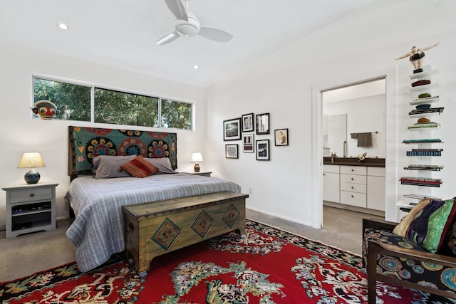 bedroom featuring connected bathroom and ceiling fan